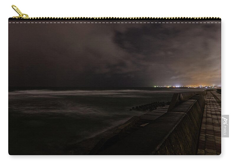 Sea Wall Zip Pouch featuring the photograph Storm Chasing by Eric Hafner