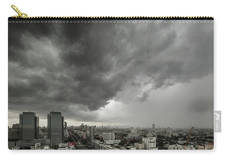 Thunderstorm Zip Pouch featuring the photograph Storm Over City by Simon Fuller Imagery