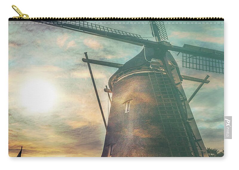 Clouds Zip Pouch featuring the photograph Sundown over Holland in the Mist by Debra and Dave Vanderlaan