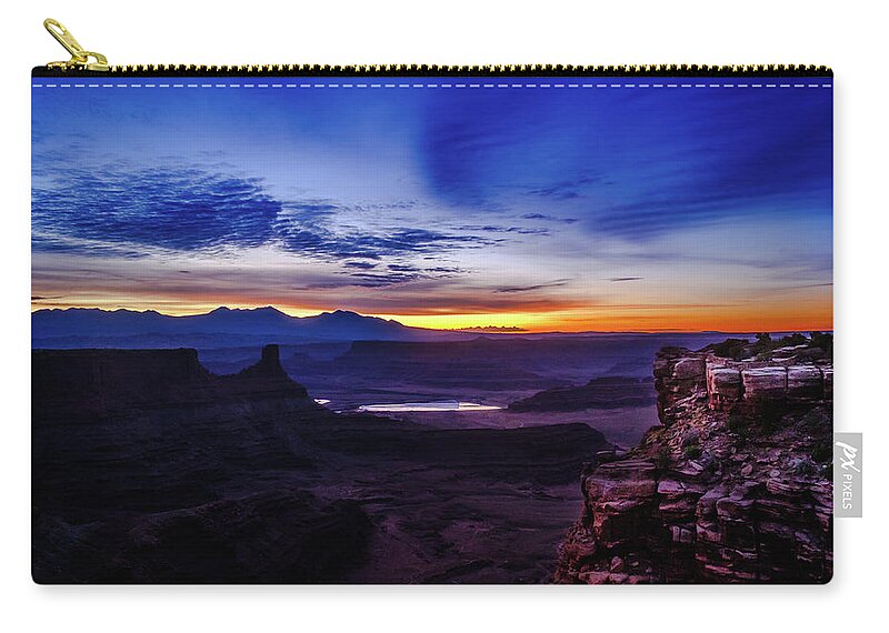Aspens Zip Pouch featuring the photograph Sunlit Cliff by Johnny Boyd