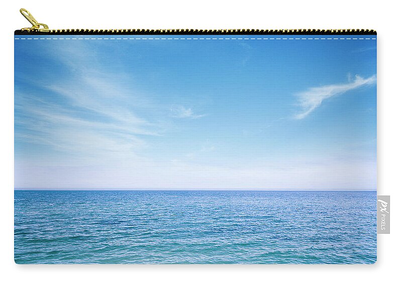 Scenics Zip Pouch featuring the photograph Sunny Ocean by Aaron Foster