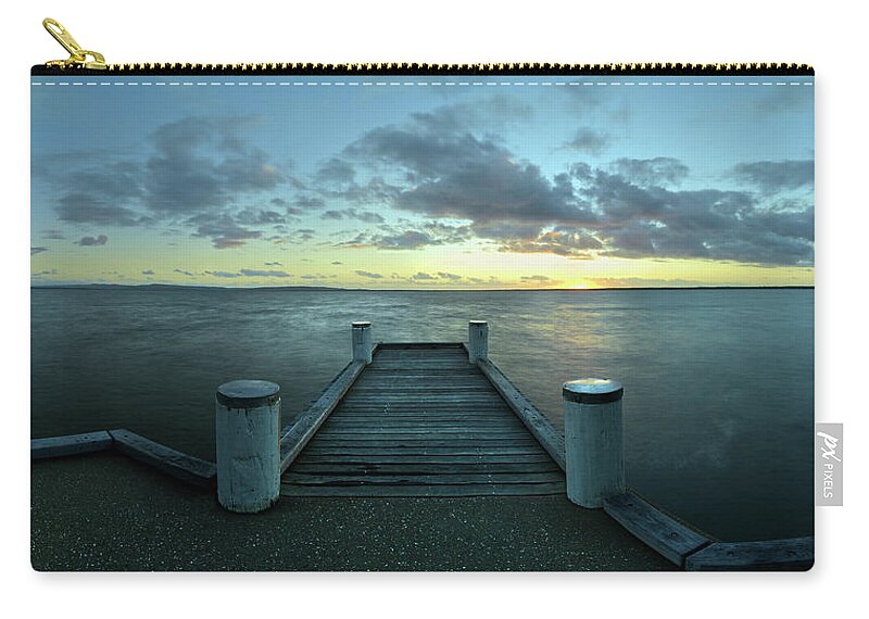 Jetty Zip Pouch featuring the photograph Sunrise at the Jetty by Nicolas Lombard