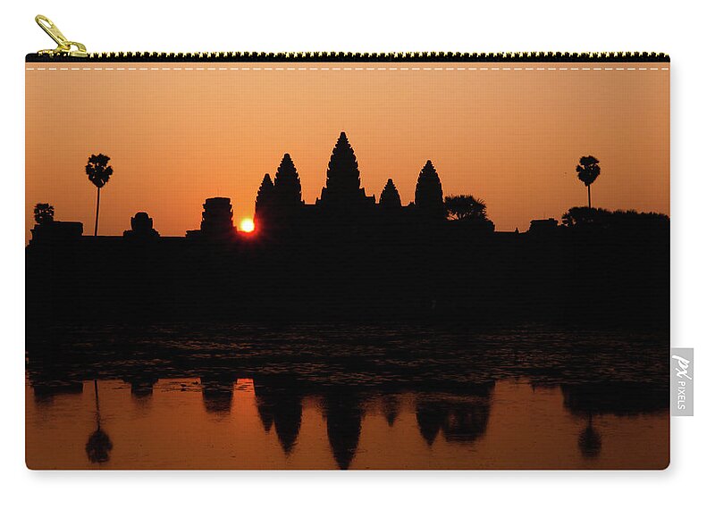 Orange Color Zip Pouch featuring the photograph Sunrise Over Angkor Wat, Cambodia by Holgs