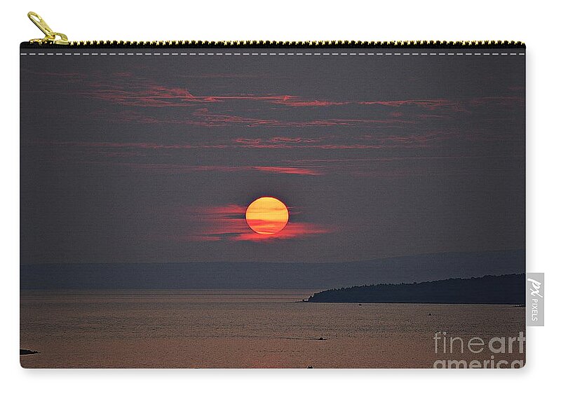 Island Zip Pouch featuring the photograph SUNSET @ RAB Island by Thomas Schroeder