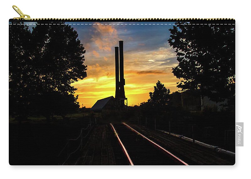 Sunset Zip Pouch featuring the photograph Sunset At The Imperial Sugar Factory Smoke Stacks Dramatic by Micah Goff