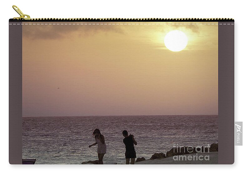 Sunset Zip Pouch featuring the photograph Sunset Fun by Raymond Earley