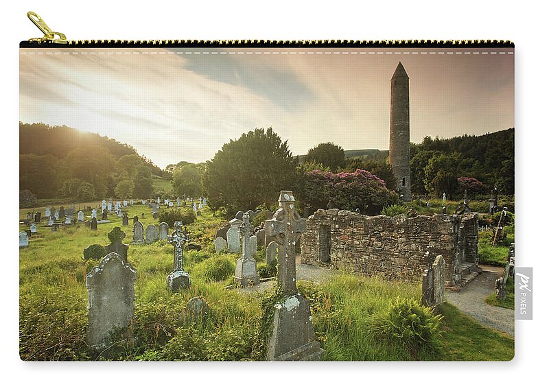 Scenics Zip Pouch featuring the photograph Sunset In Glendalough by Mammuth