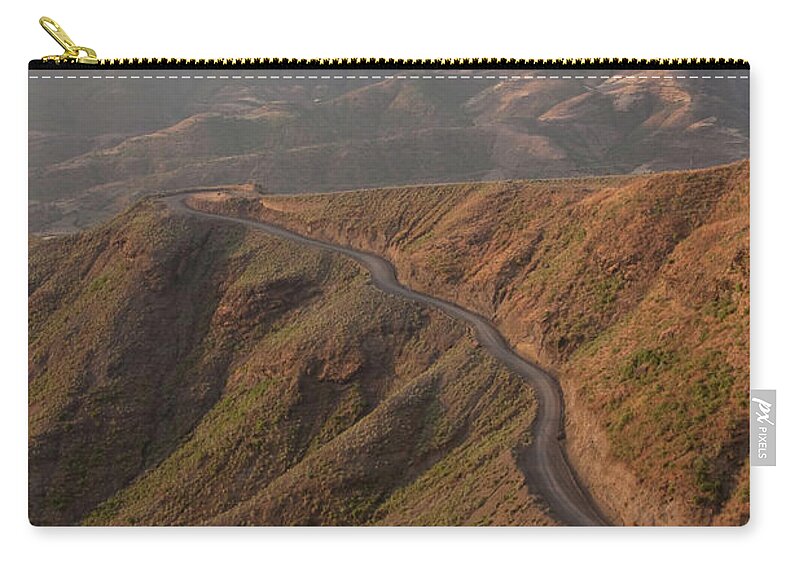 Extreme Terrain Zip Pouch featuring the photograph Sunset Lights The Rugged Mountain Pass by Mike Copeland