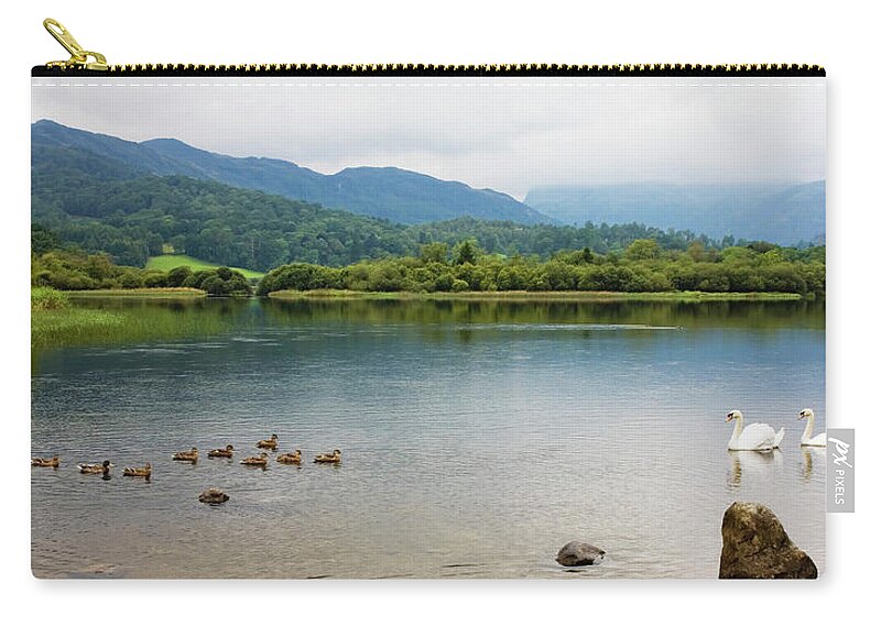 Tranquility Zip Pouch featuring the photograph Swans And Ducks Swimming In A Lake by Christine Giles / Design Pics