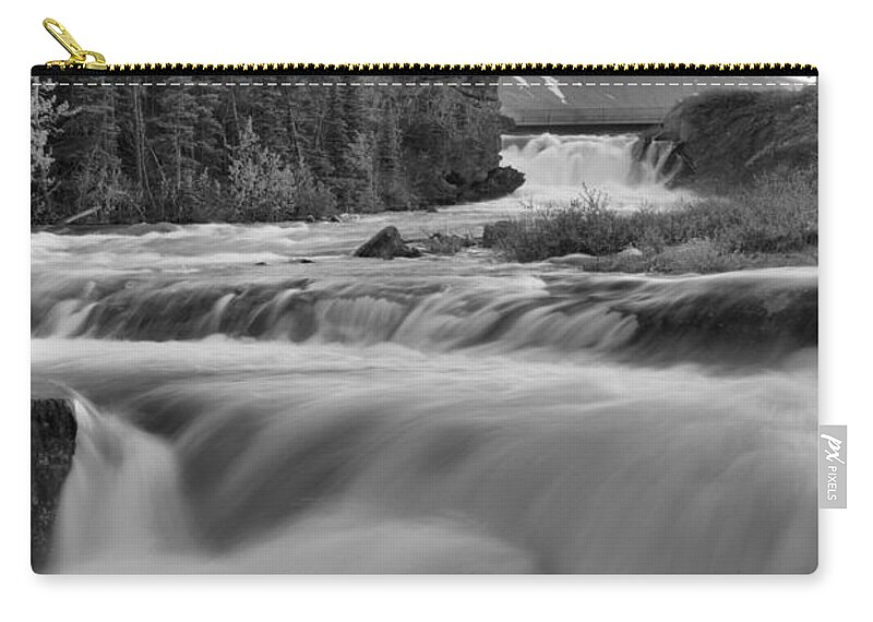 Swift Current Falls Zip Pouch featuring the photograph Swiftcurrent Falls Spring SUnset Black And White by Adam Jewell