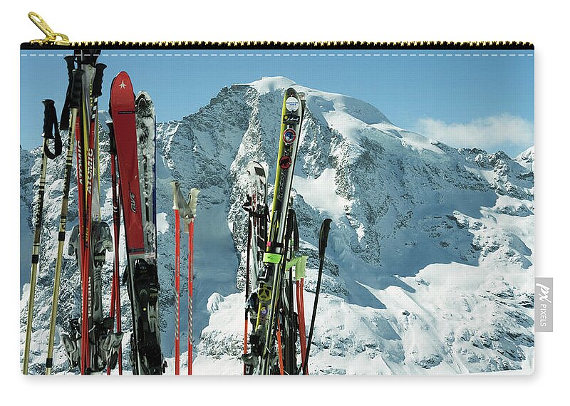 Ski Pole Carry-all Pouch featuring the photograph Switzerland, Skis In Snow by Frank Rothe