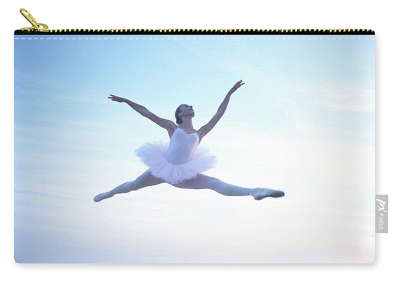 Ballet Dancer Zip Pouch featuring the photograph Teenage Ballerina 16-18 Performing Leap by Dougal Waters
