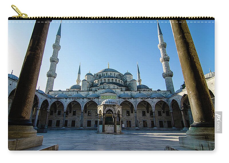 Tranquility Zip Pouch featuring the photograph The Blue Mosque by Naeem Jaffer