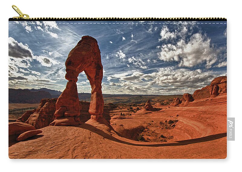 Tranquility Zip Pouch featuring the photograph The Delicate Arch by Leon C Salcedo
