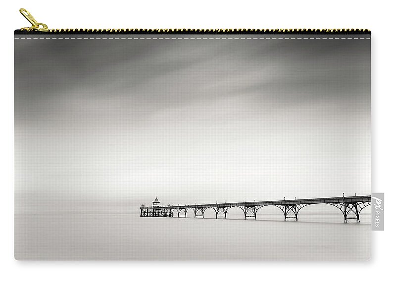 Pier Zip Pouch featuring the photograph The old Pier by Dominique Dubied