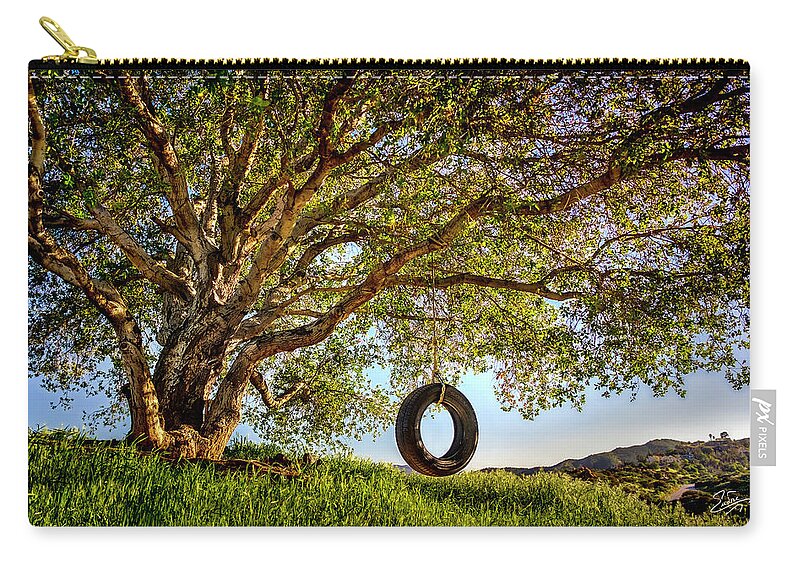 Oak Tree Zip Pouch featuring the photograph The Old Tire Swing by Endre Balogh