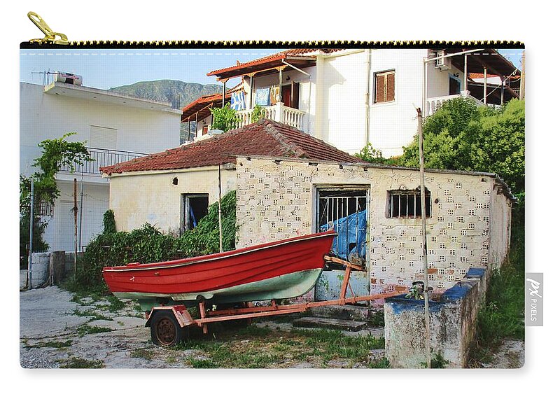 Row Boat Zip Pouch featuring the photograph The Red Row boat by Rosita Larsson
