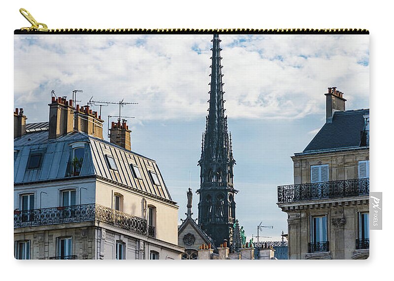 Notre Dame Zip Pouch featuring the photograph The Spire of Notre Dame by Liz Albro