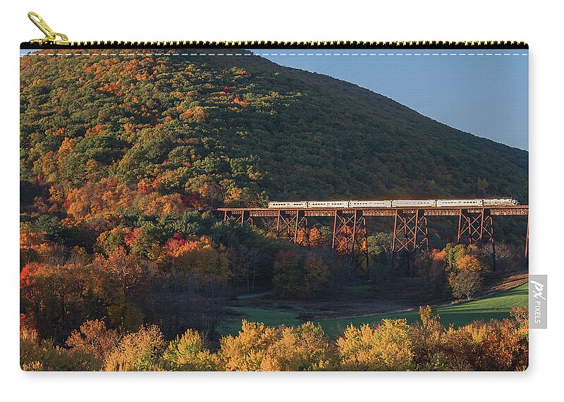 Sunrise Zip Pouch featuring the photograph The Sunrise Express by Angelo Marcialis