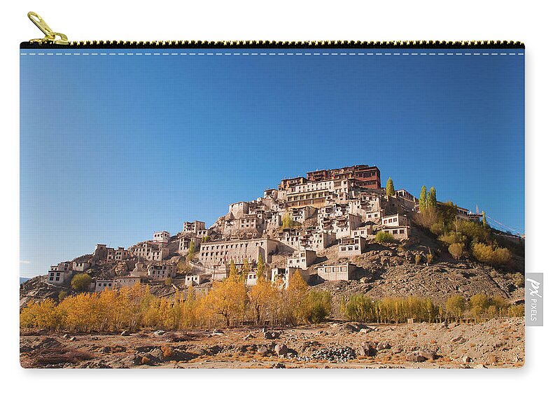Himalayas Zip Pouch featuring the photograph Thiksey by Wong Yu Liang