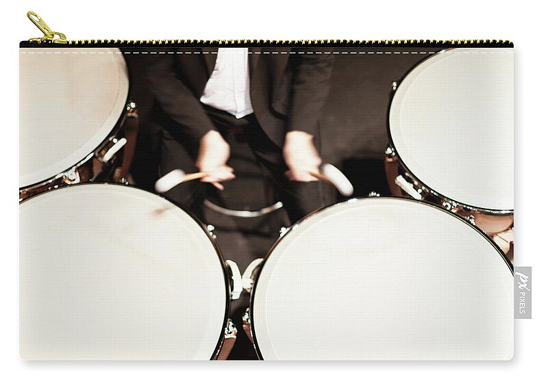 Young Men Zip Pouch featuring the photograph Timpani Player In Orchestra by Hybrid Images