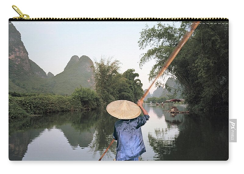 Chinese Culture Zip Pouch featuring the photograph Traditional Raft On Yulong River by Martin Puddy