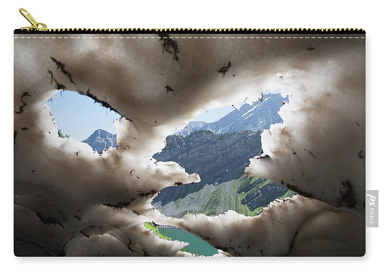 Scenics Zip Pouch featuring the photograph Underneath A Melting Snow Pack With by Michael Interisano / Design Pics