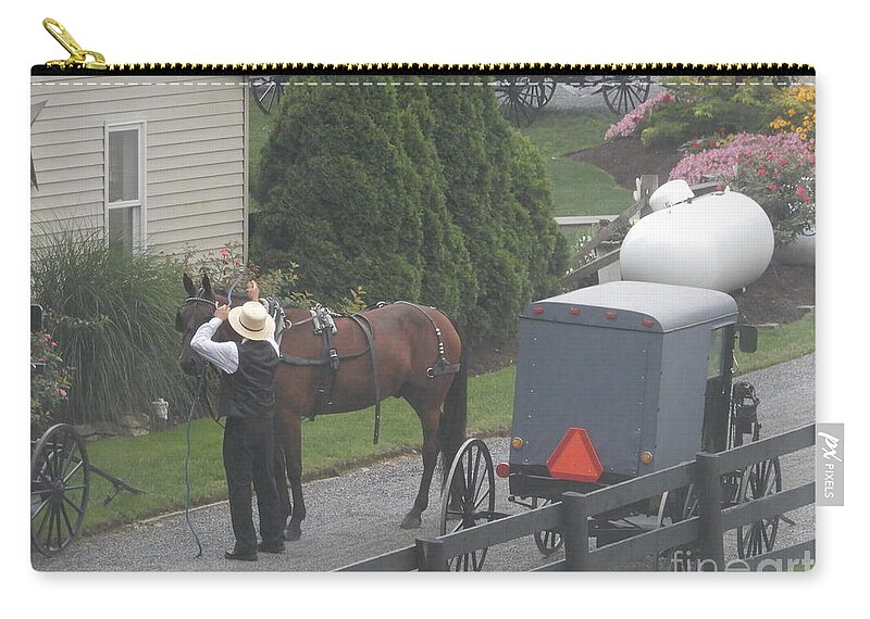 Amish Zip Pouch featuring the photograph Unhitching the Horse on a Sunday by Christine Clark