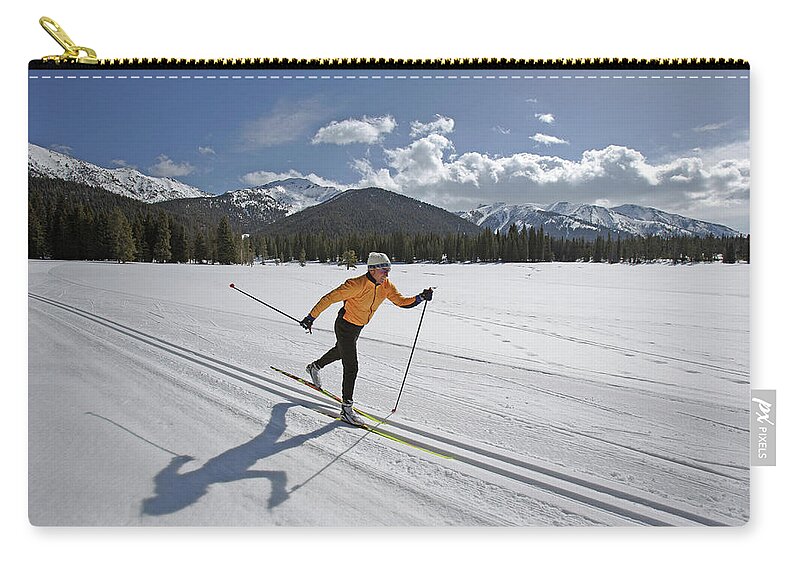 Ski Pole Zip Pouch featuring the photograph Usa, Sun Valley, Idaho, Mature Man by Karl Weatherly