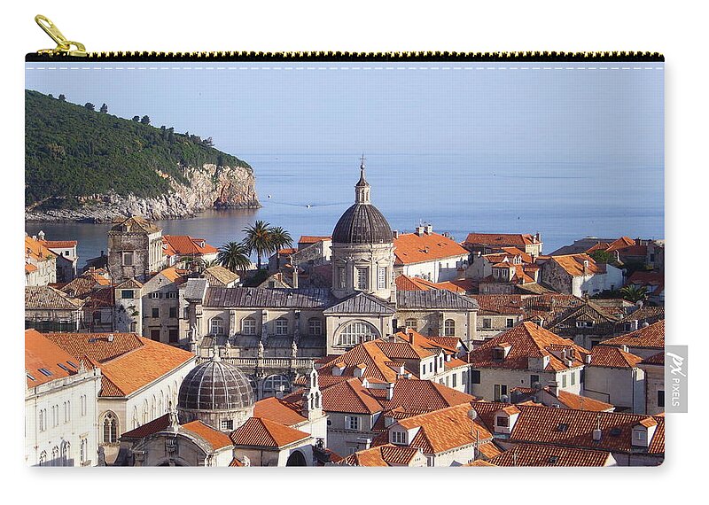 Old Town Zip Pouch featuring the photograph View Of Cathedral In Old Town by Marianna Sulic