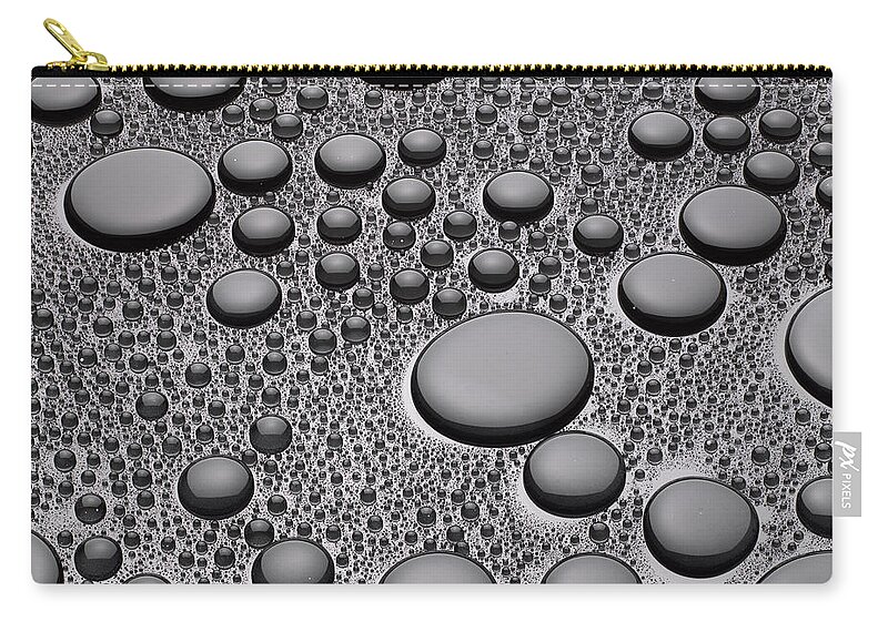 Outdoors Zip Pouch featuring the photograph Water Drops On A Smooth Background by Don Farrall