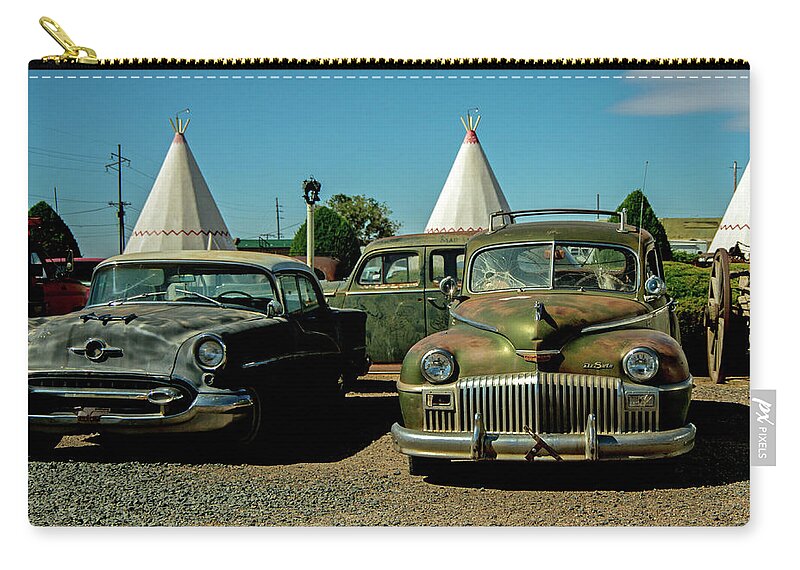 Wigwam Motel Zip Pouch featuring the photograph Wigwam Relics by Stephen Whalen