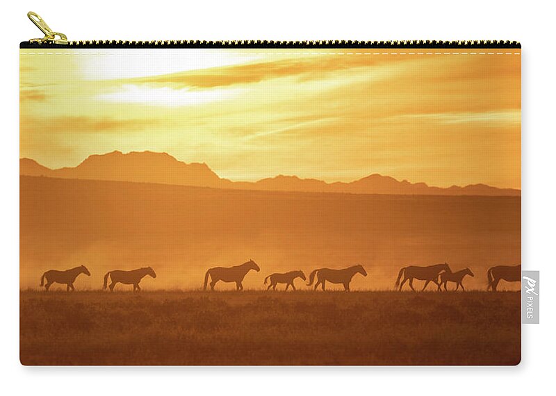 Wild Horses Zip Pouch featuring the photograph Wild Sunset by Mary Hone