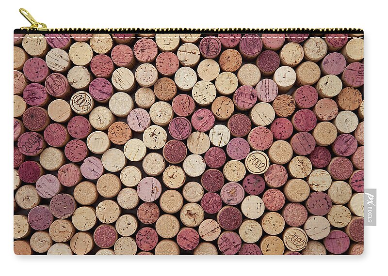 In A Row Zip Pouch featuring the photograph Wine Corks by Dem10