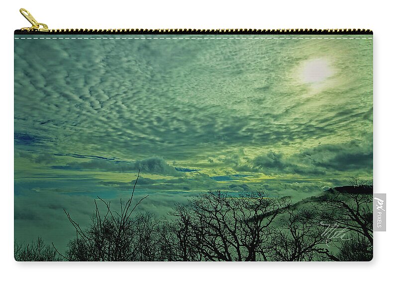 Thunder Mountain Zip Pouch featuring the photograph Winter Clouds by Meta Gatschenberger