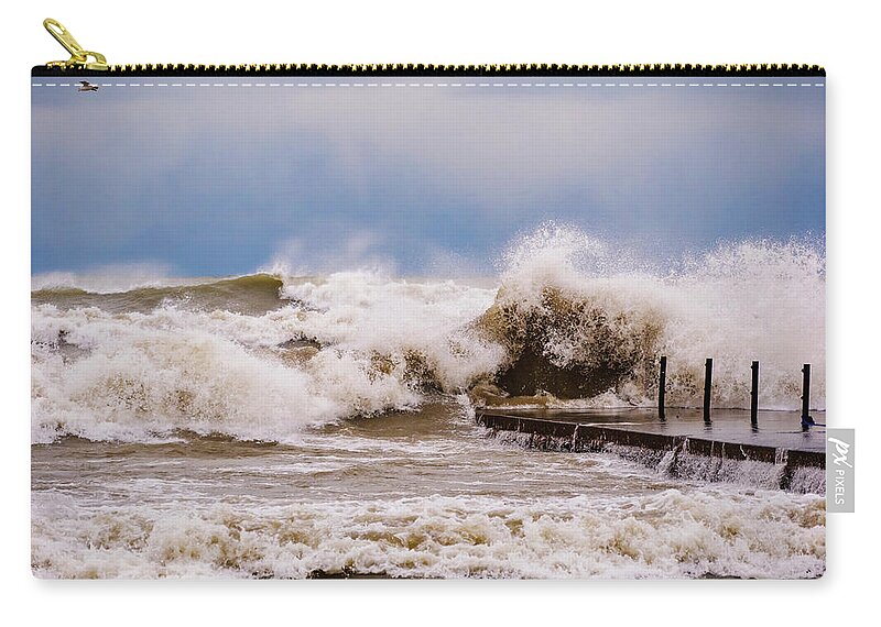 Great Lakes Zip Pouch featuring the photograph Witch of November by Todd Bannor