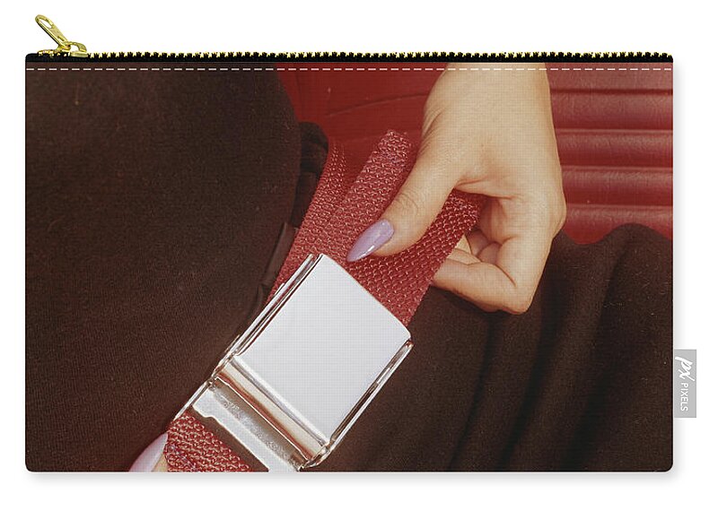 People Zip Pouch featuring the photograph Woman Fastening His Seatbelt, Close-up by Tom Kelley Archive