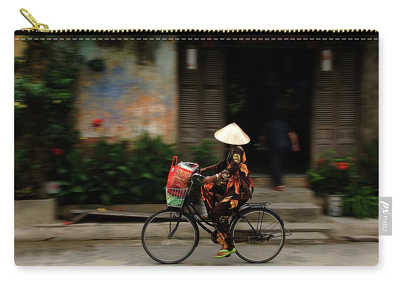 Mature Adult Zip Pouch featuring the photograph Woman On Bicycle, Hoi An, Vietnam by Jeremy Horner