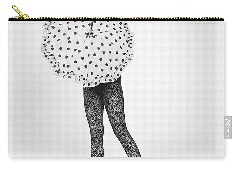 White Background Zip Pouch featuring the photograph Woman Wearing Stockings And Holding by H. Armstrong Roberts