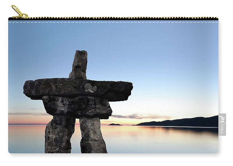 Water's Edge Zip Pouch featuring the photograph Xxl Midnight Sun Inukshuk by Sharply done