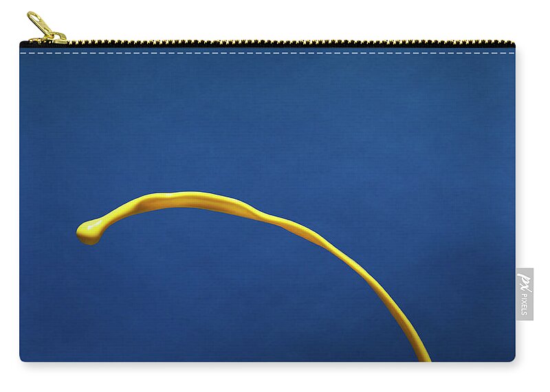 Copenhagen Zip Pouch featuring the photograph Yellow Paint On Blue Surface by Henrik Sorensen