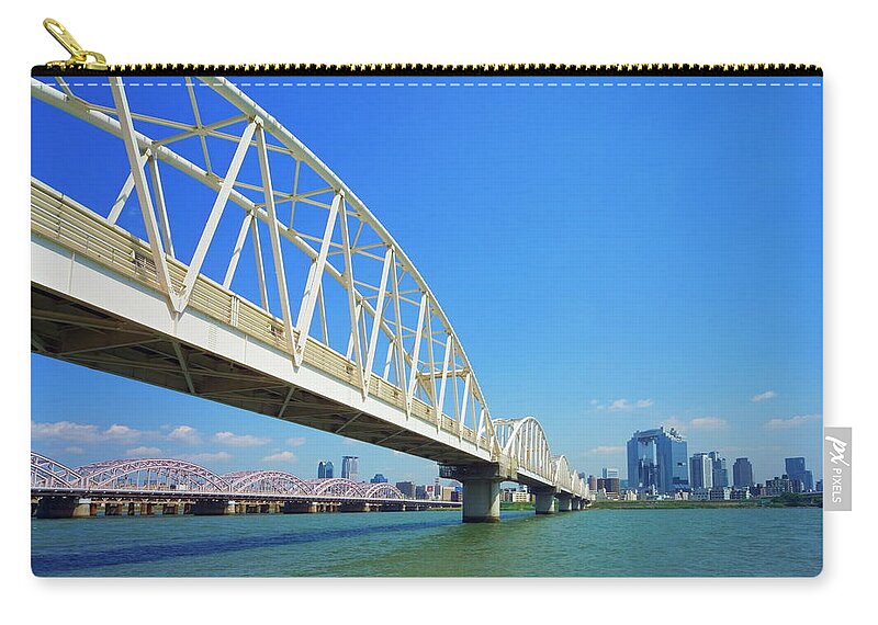 Office Zip Pouch featuring the photograph Yodogawa River And Office Buildings In by Gyro Photography/amanaimagesrf
