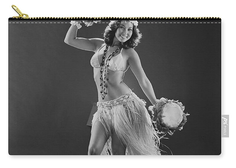 People Zip Pouch featuring the photograph Young Woman Hula Dancer With Feathered by Tom Kelley Archive