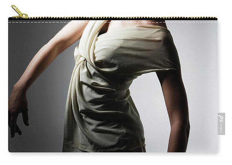 Ballet Dancer Zip Pouch featuring the photograph Young Woman Performing Dance by Win-initiative/neleman