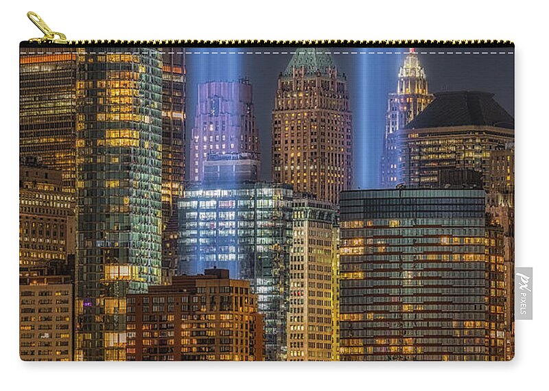 Tribute In Light Zip Pouch featuring the photograph A NYC 911 Tribute #1 by Susan Candelario