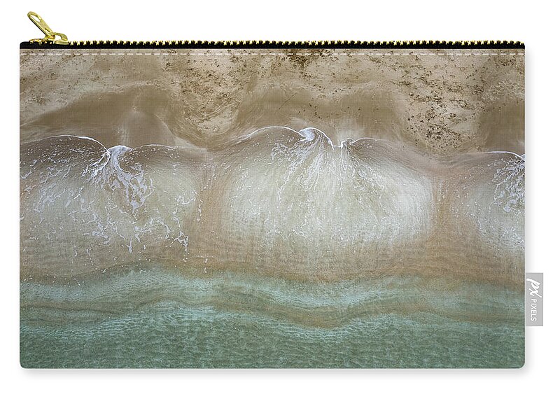 Golden Sand Carry-all Pouch featuring the photograph Aerial view drone of empty tropical sandy beach with golden sand. Seascape background by Michalakis Ppalis