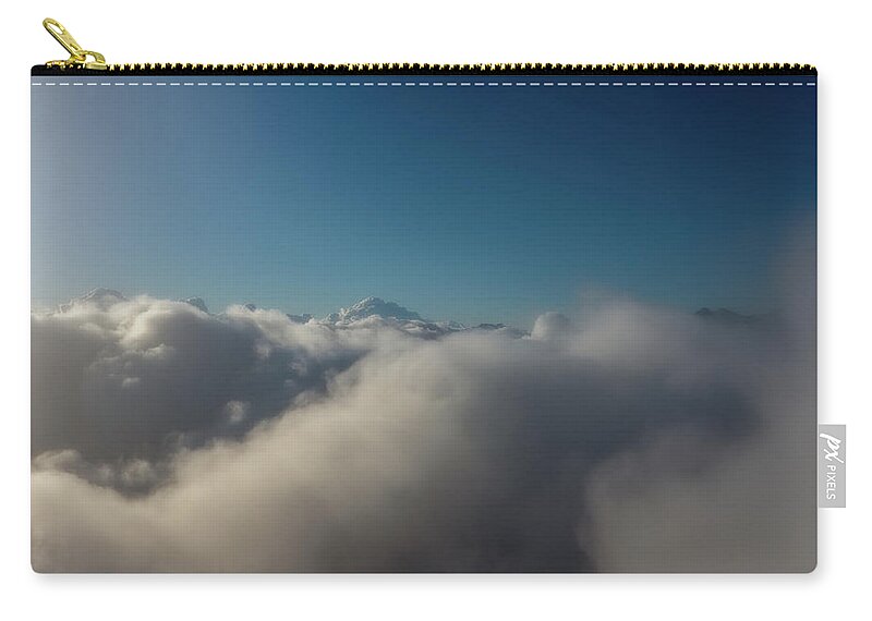 Cloud Zip Pouch featuring the photograph Aerial view of clouds at sunrise #1 by Mikhail Kokhanchikov
