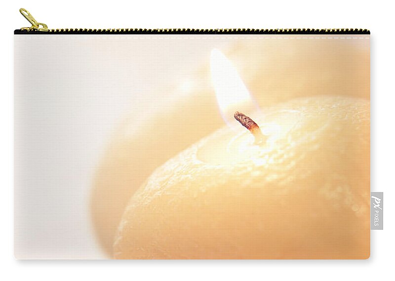 Ambience Zip Pouch featuring the photograph Round Aromatherapy Candle Burning by Olivier Le Queinec