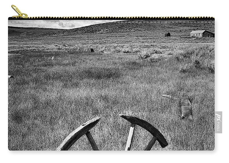 Bodie Zip Pouch featuring the photograph Bodie Ghost Town Wheel #1 by Jon Glaser
