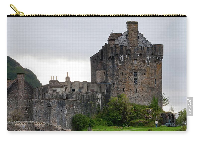 Scotland Carry-all Pouch featuring the photograph Eilean Donan Castle in the loch Alsh at the highlands of Scotlan by Michalakis Ppalis